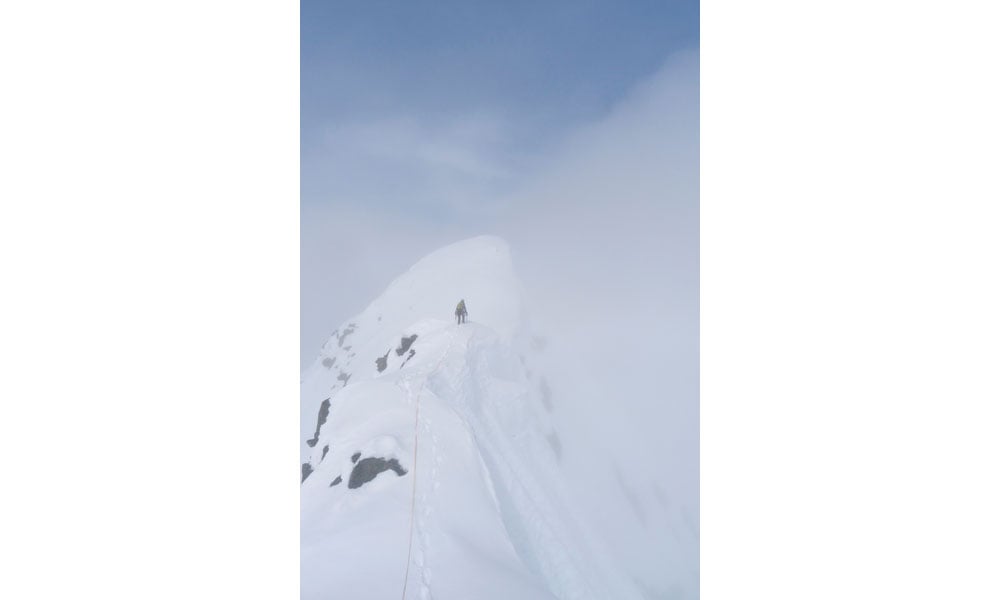 Moving through clouds on the summit ridge of Mt. Johnson. Photo: Kim Hall