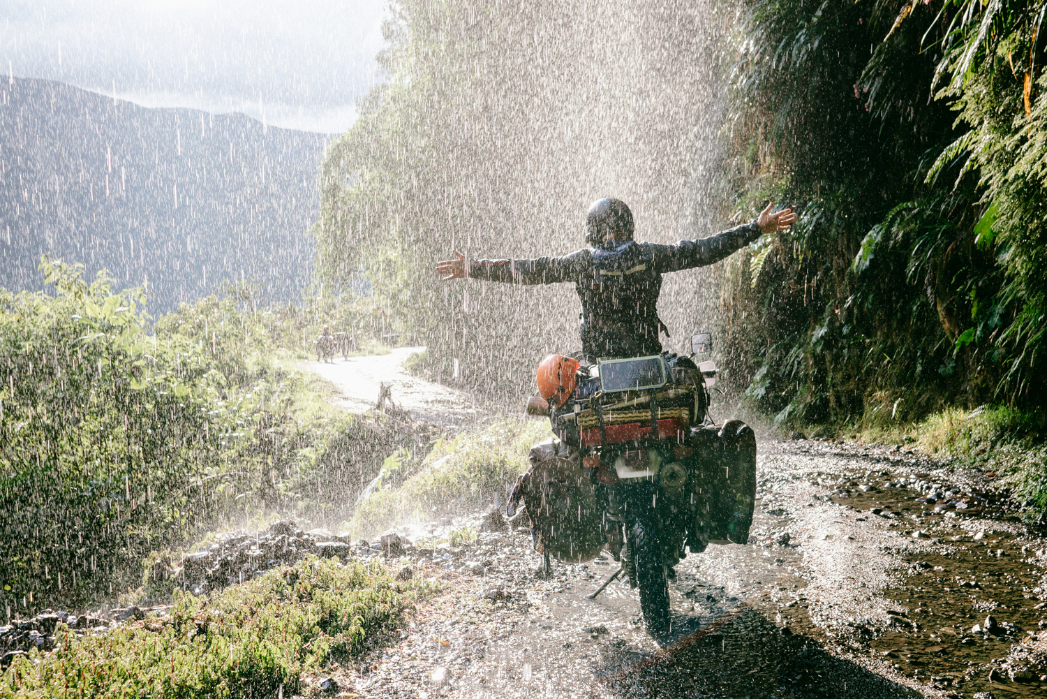 Motorcycle under a waterfall