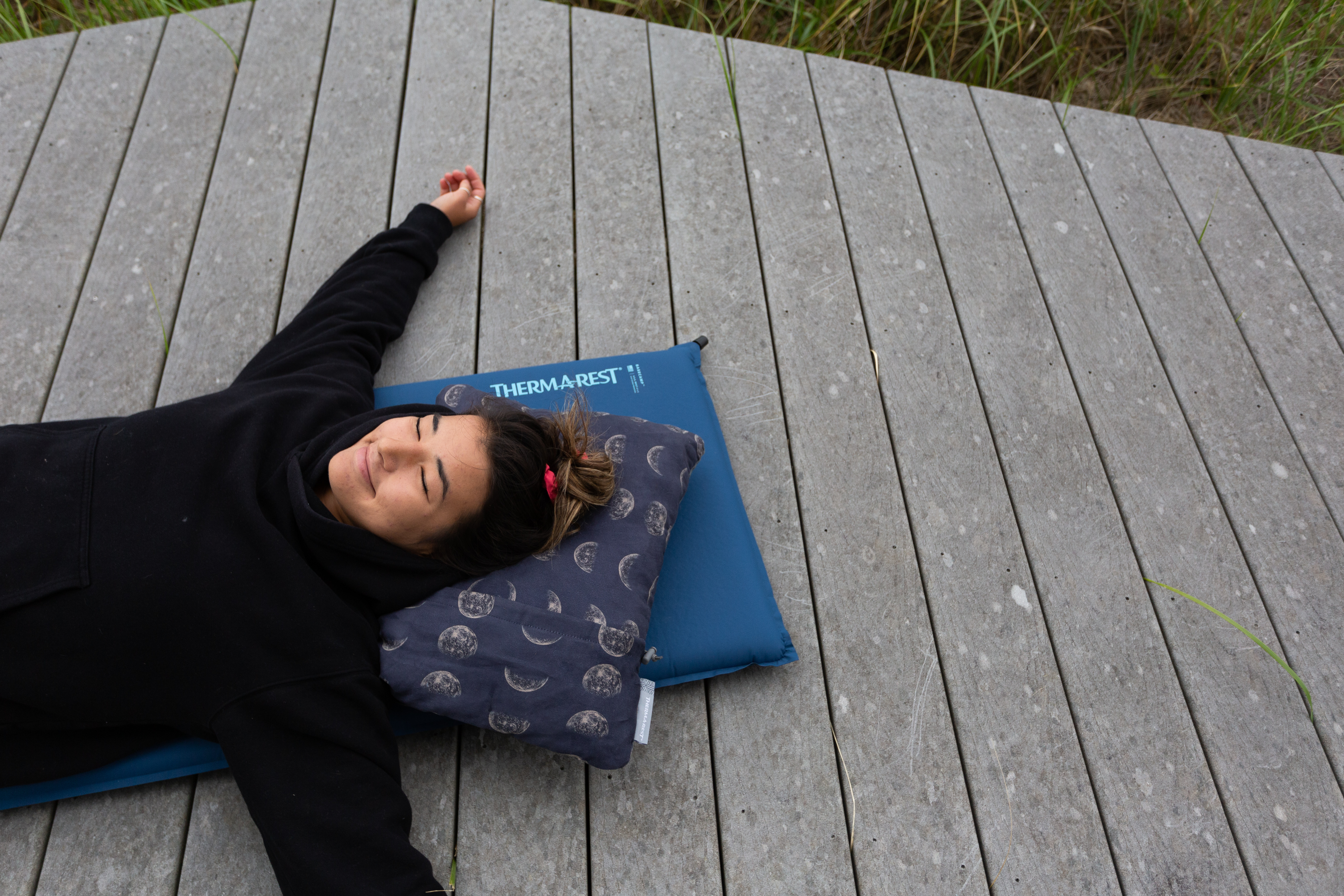 Relaxing on a Therm-a-Rest sleeping pad